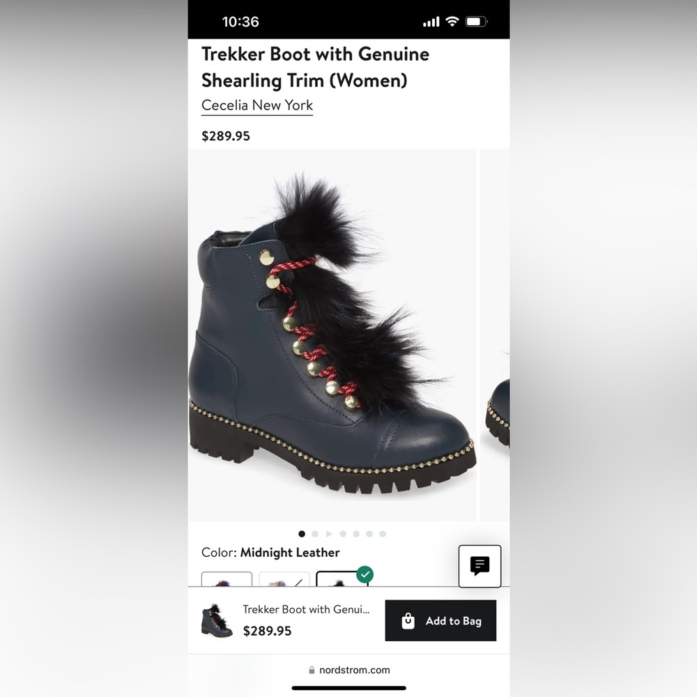 Cecelia New York navy blue boots with the fur!  Excellent condition!
